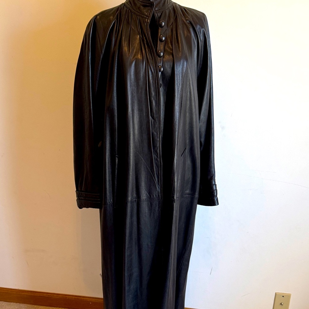Erez black leather coat. Like new. Runs big. Floor length